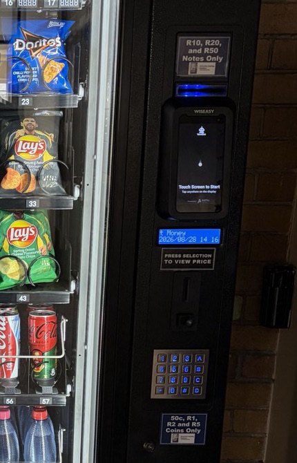 A VendBot P5L payment terminal fitted to a CV1000 vending machine, with cash also accepted